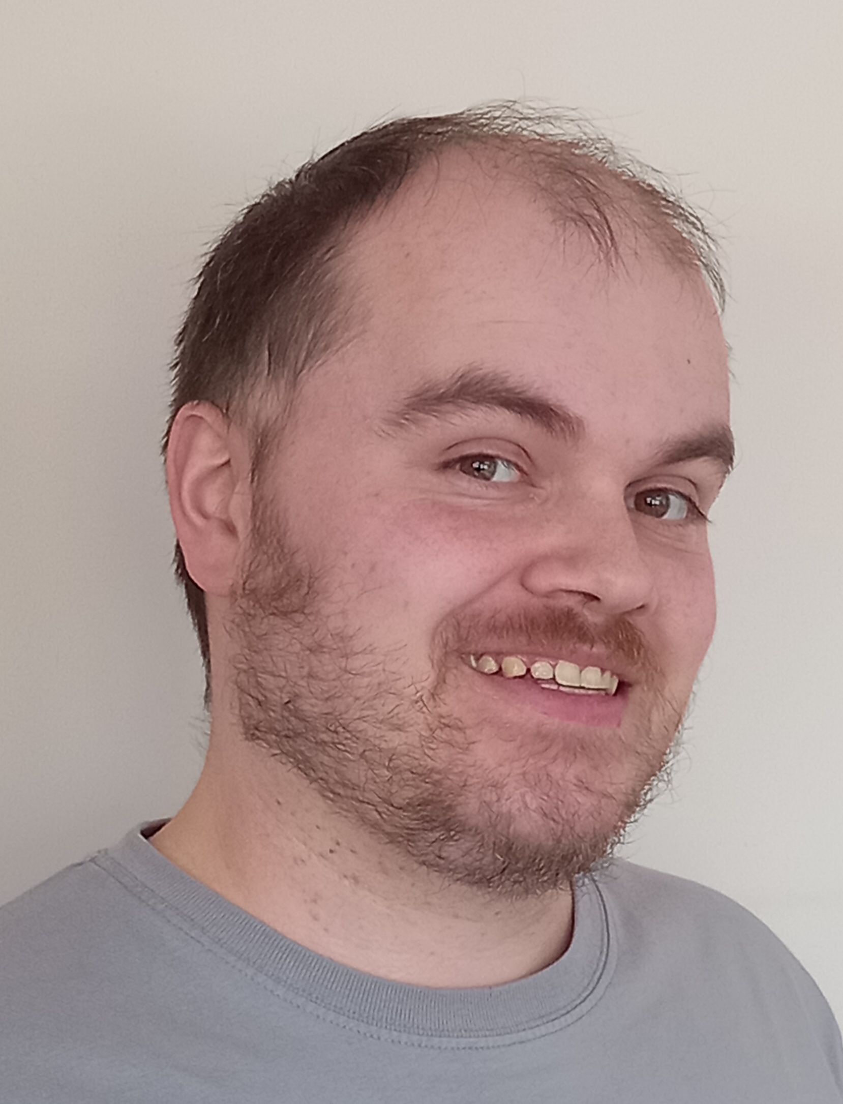 A headshot of Eoin Simpson, research assistant